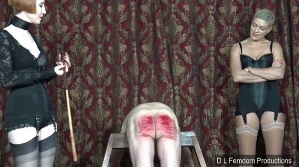 Domina Liza, The Hunteress - Caning in Corsetry