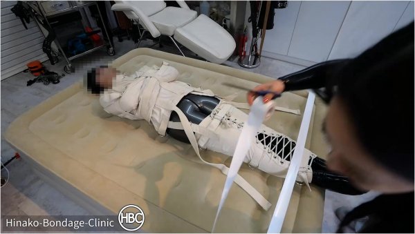 Hinako Bondage Clinic - Taped Down to the Bed in a Latex Cat Suit and Canvas Straitjacket - BONDAGE