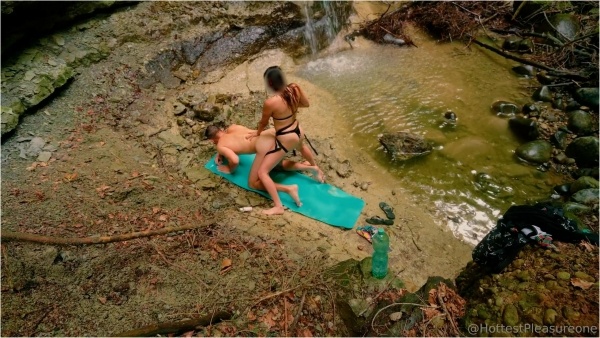 Mia Reider - Sexy brunette babe pegging her boyfriend next to a public Waterfall